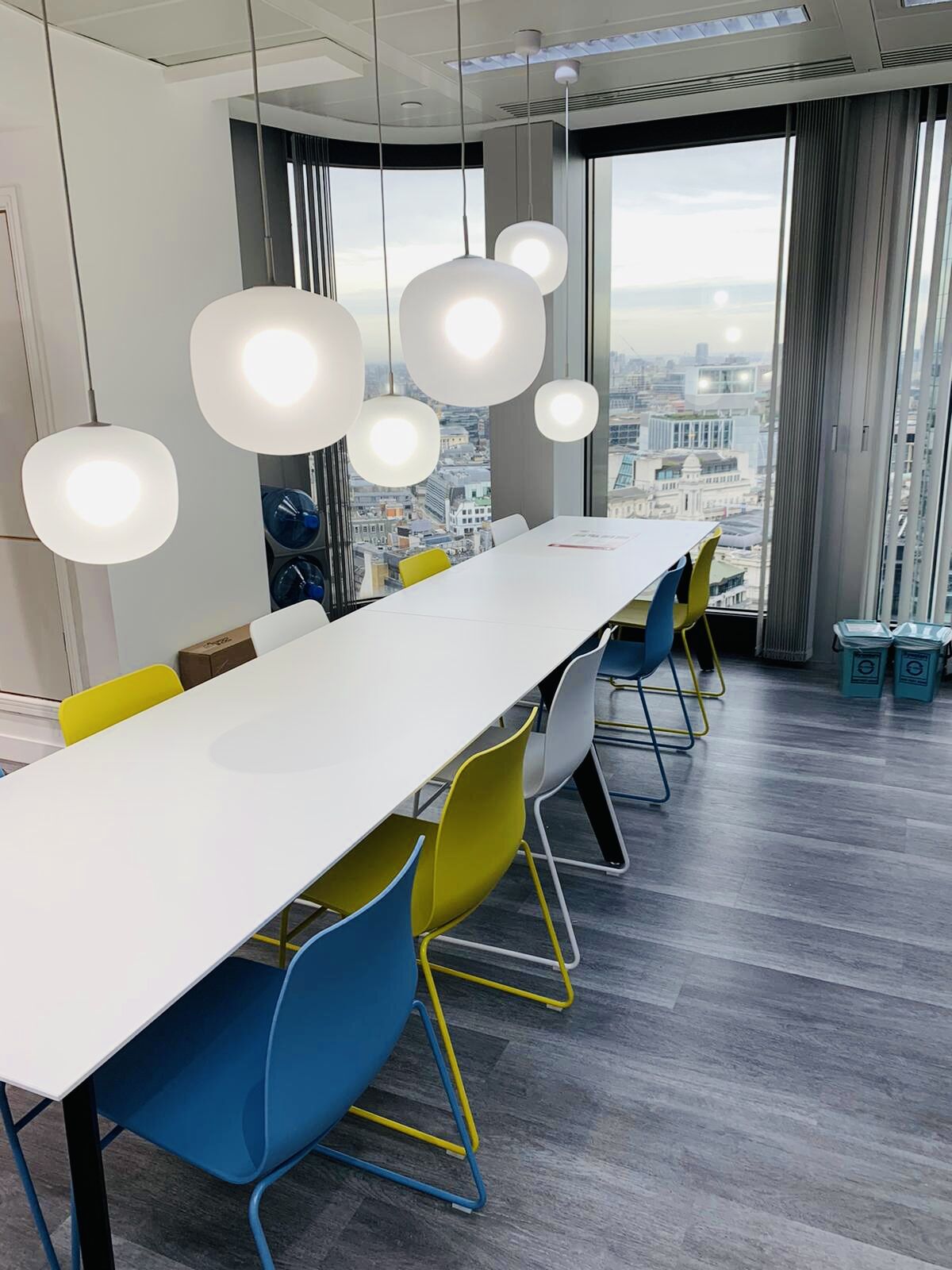 Table with colourful seating and lights