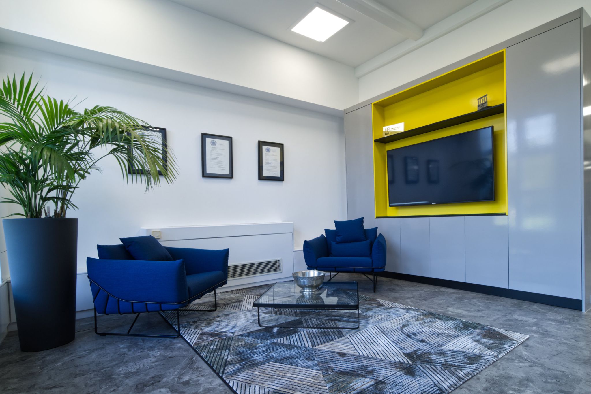 Seating Area with blue chairs